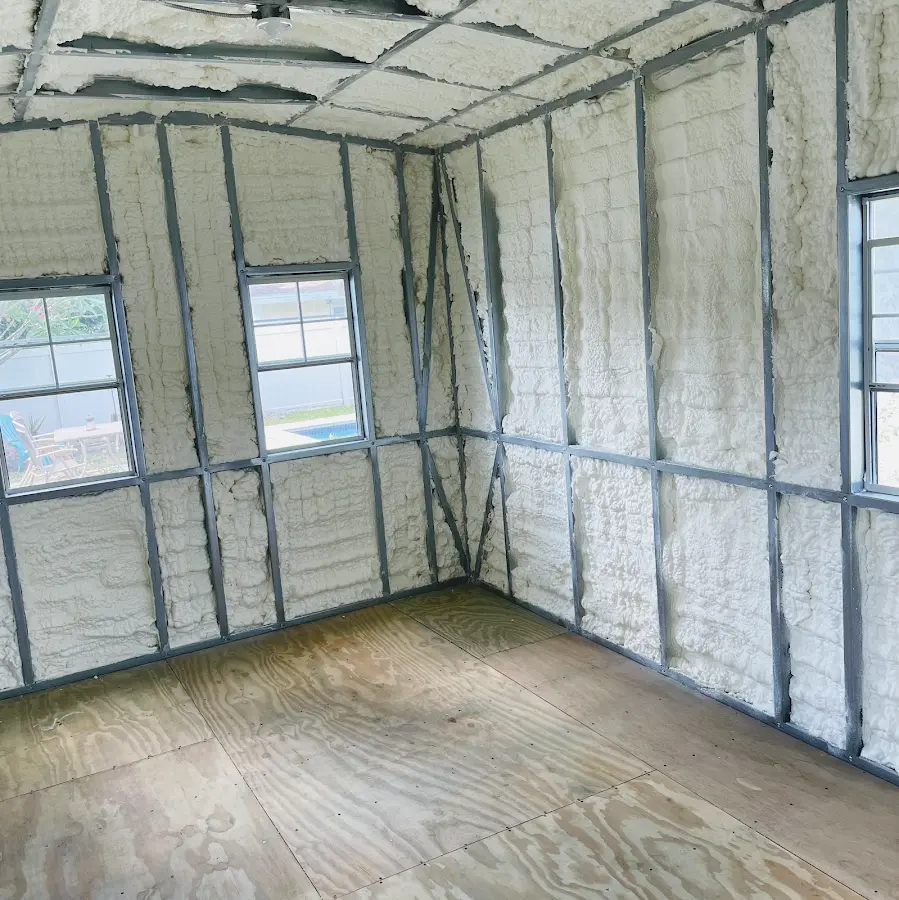 Closed-cell spray foam insulation applied to wall cavities in a residential project in Glens Falls
